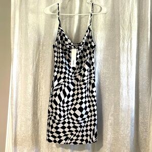NWT. Satin feel, checkered spaghetti strap mini dress